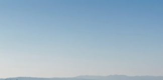 Default_A_panoramic_view_of_a_rural_landscape_with_expansive_g_3