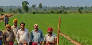 Default_A_vibrant_rural_setting_with_a_group_of_farmers_standi_1